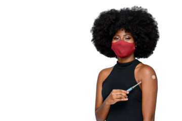 Black teen girl  points to her arm with vaccine sticker