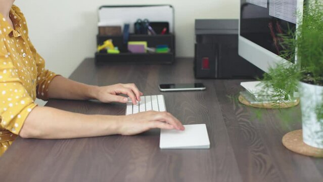 woman hands touching touchpad white keyboard work computer home office concept freelance business distant lifestyle. learning online teaching web net. computer monitor screen files choose data pad