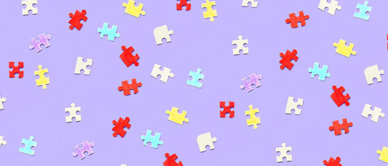 Many pieces of jigsaw puzzle on lilac background. Pattern for design