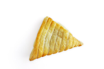 One isolated Apple turnover, croissant, cake. pastry, bakery on the white background. Top vie. Close-up. Copy space
