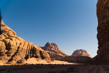 wadi rum desert, Jordan. rocky mountains and rock formation process against the blue sky. High quality photo