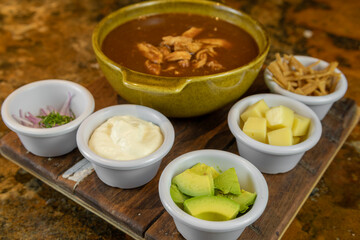 Typical colombian food, tortilla soup with chicken