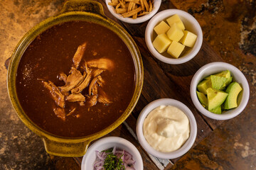 Typical colombian food, tortilla soup with chicken