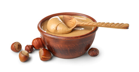 Bowl of tasty hazelnut butter on white background