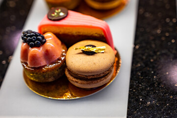 Austrian desserts, different types of chocolate and fruit cakes in cafe in Vienna.