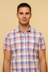 Portrait of handsome young man in casual shirt