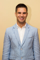 Portrait of handsome young man in suit