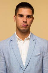 Portrait of handsome young man in suit