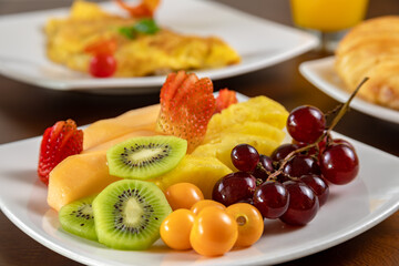Typical colombian food, breakfast with egg, fruit and bread