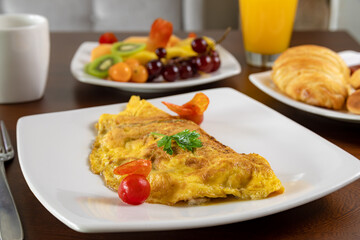 Typical colombian food, breakfast with egg, fruit and bread