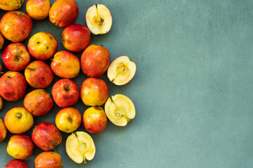 Fresh red apples on a gray background. Fruit. View from above. Free space for text.