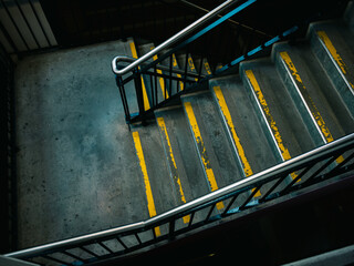 Staircase with yellow paint