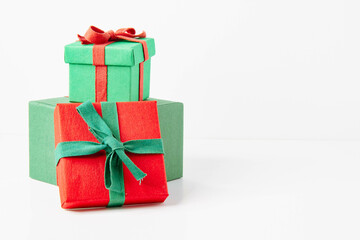 Present. Gift box with a bow. New Year's surprise. Red and green box with a gift