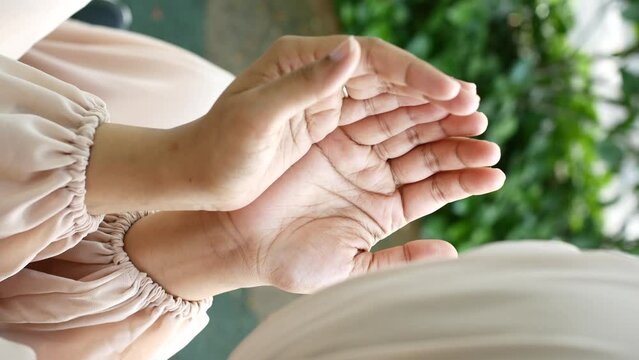 Close up of muslim women hand praying at ramadan 