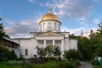 Fototapeta na wymiar View of the St. Michael's Cathedral of the Holy Dormition Pskov-Pechersk Monastery, Pechora, Pskov region, Russia