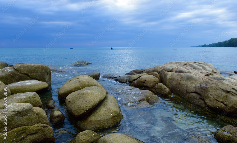 Wall mural sea beach with rocks and beautiful water.