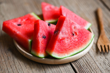 Sweet watermelon slices pieces fresh watermelon tropical summer fruit, Watermelon slice on plate wooden background