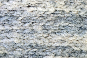 Snow white wool yarn cloth background. Surface of fabric texture in white winter color.