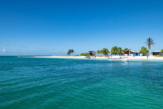 Tropical white beach with crystalline water in "Dos Mosquises" islands (Los Roques Archipelago, Venezuela).
