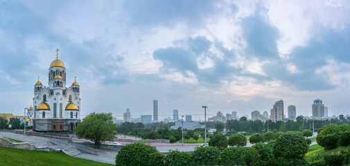 Panorama of spring or summer Yekaterinburg and Temple on Blood in cloudy sunset. Yekaterinburg, Russia