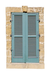 Old wooden window with closed blue lattice shutters. Vertical. Isolated on a white background.