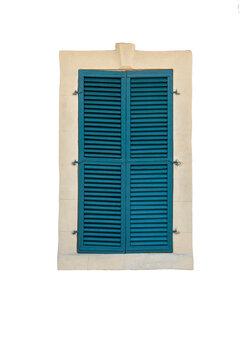 Old wooden window with closed blue attice shutters. Vertical. Isolated on a white background.