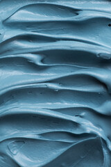 Light blue icing frosting close up texture