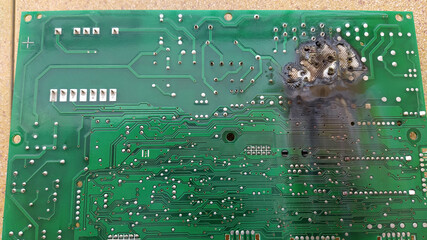 damaged microchip. burnt chip from a heating boiler