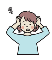 頭をかかえる女性