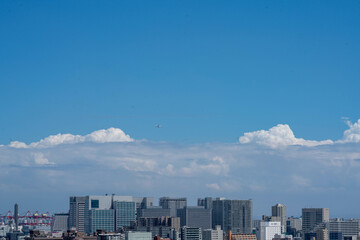 cumulonimbus cloud in blue sky with skyscrapers in Tokyo JAPAN