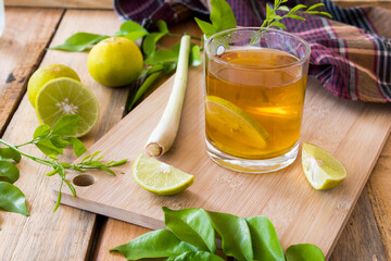 lemon tea herbal drinks for health care with vegetables arrangement flat lay style on background wooden