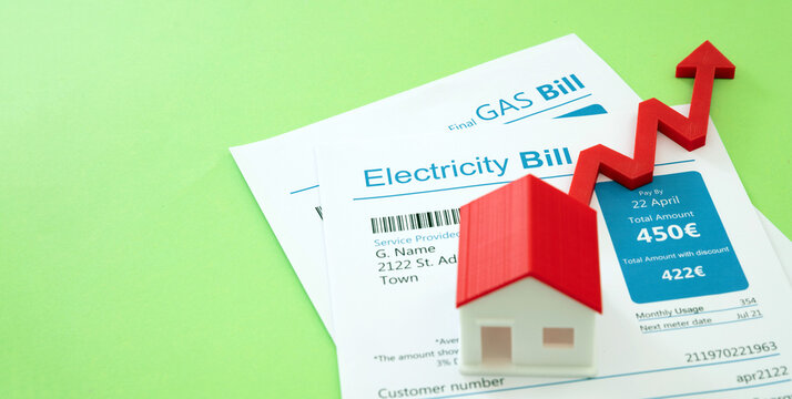 Home electricity heating and water cost increase. House, bills and arrow up.