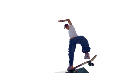 Naklejka premium Skateboarder doing a trick isolated on white background