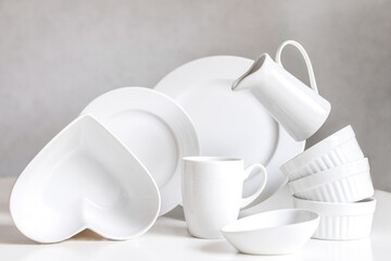 White empty ceramic tableware for serving on the table. Kitchen still life