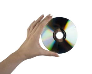 a compact disk in the female hand on a transparent background
