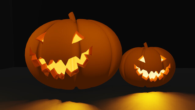 two halloween pumpkin jack o lantern scary face with light glowing inside in the black background