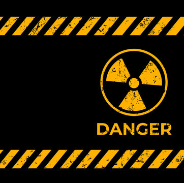 Radiation warning grunge background. Vector radioactive symbol with grungy texture on black backdrop with yellow stripes. Nuclear radiation, toxic waste warning, biohazard, atomic energy attention