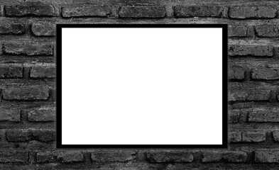 Mockup white picture frame on black brick wall background with clipping path