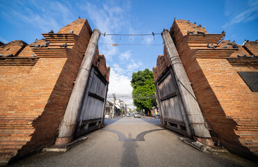 Tha Phae Gate, Chiang Mai old city ancient wall, famous tourist landmark with beautiful blue sky...