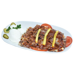 Traditional Turkish Bursa iskender kebap doner served with special red sauce and yogurt, garnished...