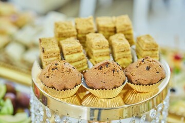 Beautiful and bright desserts on the festive table for the party.