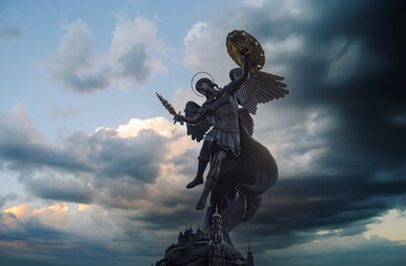 Fountain with a sculpture of Archangel Michael in the park Volodymyr Hill in Kyiv, Ukraine