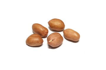 five peanuts on a white background