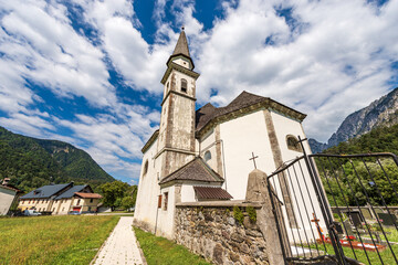 Fototapeta premium Church of Saint Gottardo, XV century, Bagni di Lusnizza village, Malborghetto-Valbruna municipality, Udine province, Friuli-Venezia Giulia, Italy, Carnic Alps and Julian Alps, Europe.