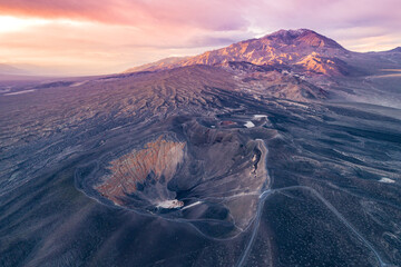 Sunrise in Ubehebe Crater. Death Valley, California. Beautiful Morning Colors and Colorful Landscape in Background. Sightseeing Place. Drone Viewpoint. © Mindaugas Dulinskas