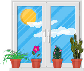 White window with flowers on wall