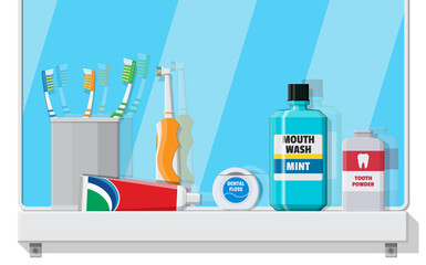 Bathroom mirror and dental cleaning tools