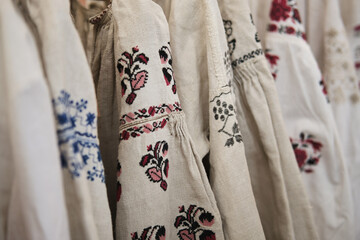 Close up vyshyvanka blouses Ukrainian national clothes. Blur and selective focus.