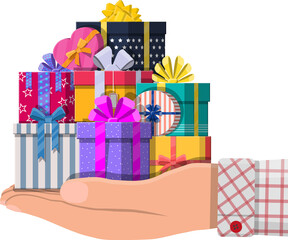Colorful wrapped gift box in hand
