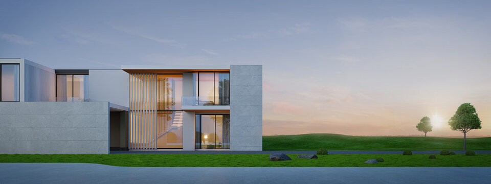 Luxury modern house on grass with sunset background,Concept for real estate or property.3d rendering